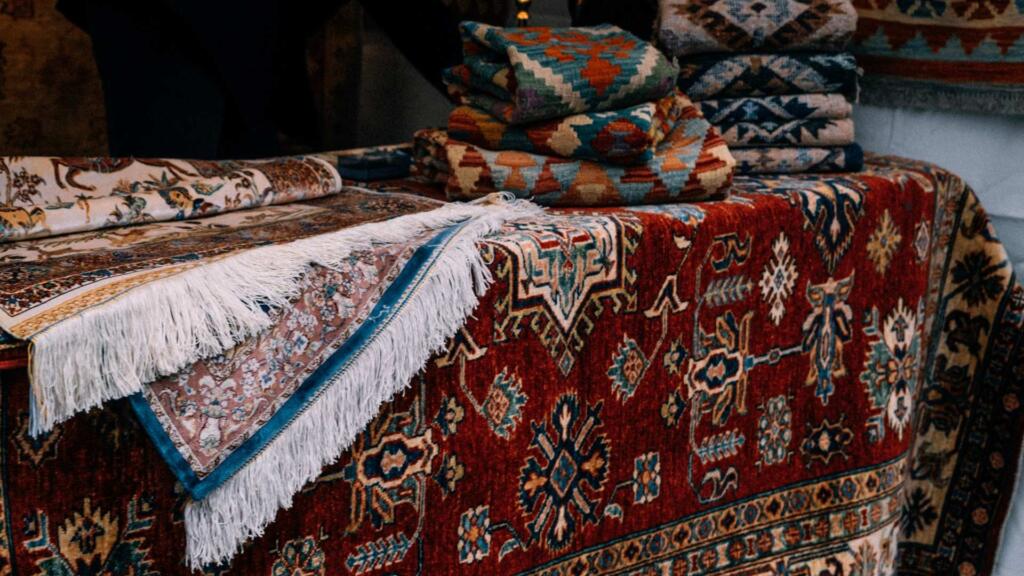 Vibrant and intricately designed carpets on display at American Carpet Wholesalers in Georgia, showcasing premium quality and craftsmanship.