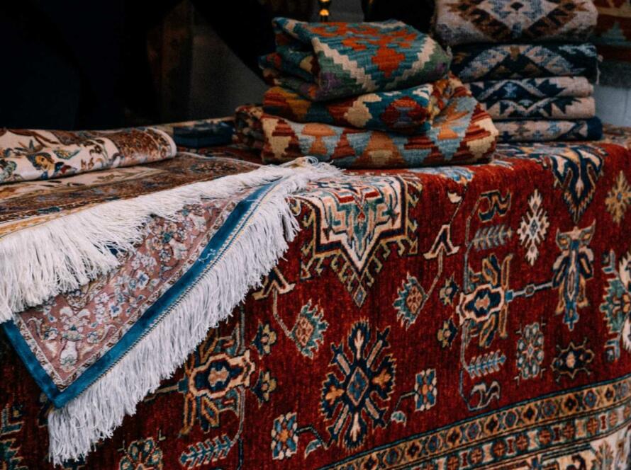 Vibrant and intricately designed carpets on display at American Carpet Wholesalers in Georgia, showcasing premium quality and craftsmanship