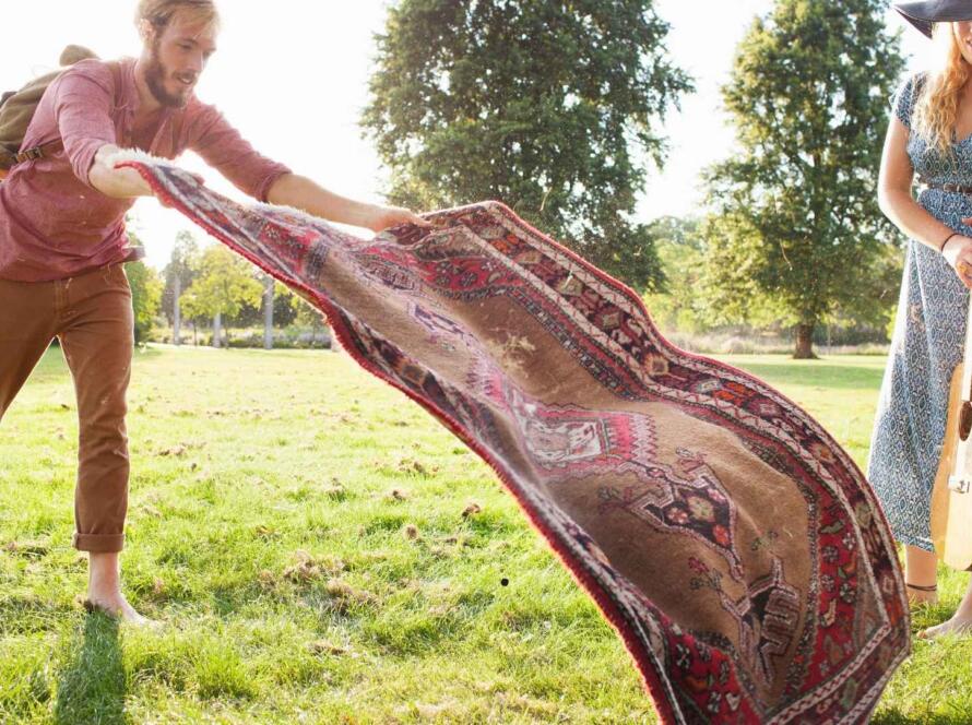 Custom outdoor rug on a patio, enhancing outdoor space with style and durability