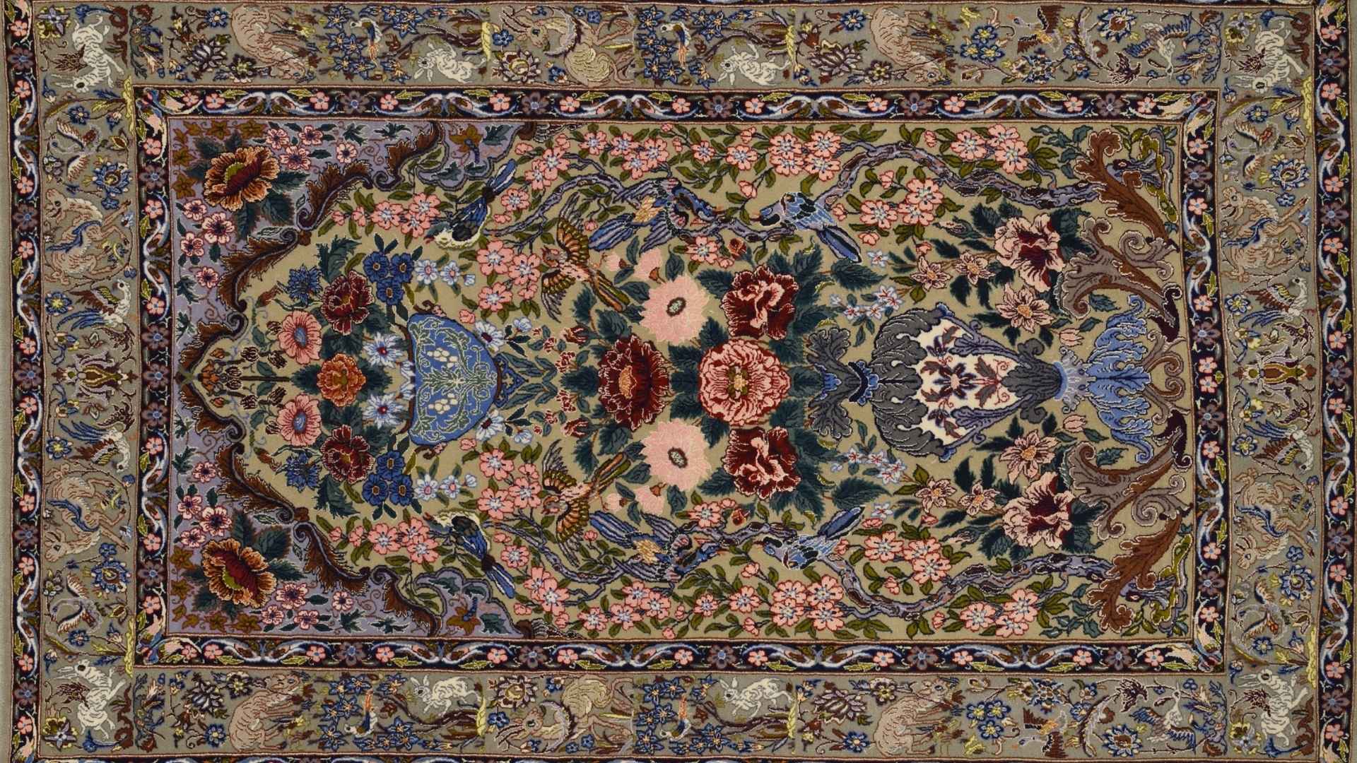 A vibrant, intricately designed wholesale area rug featuring floral and ornamental patterns, ideal for choosing the best decor solution.