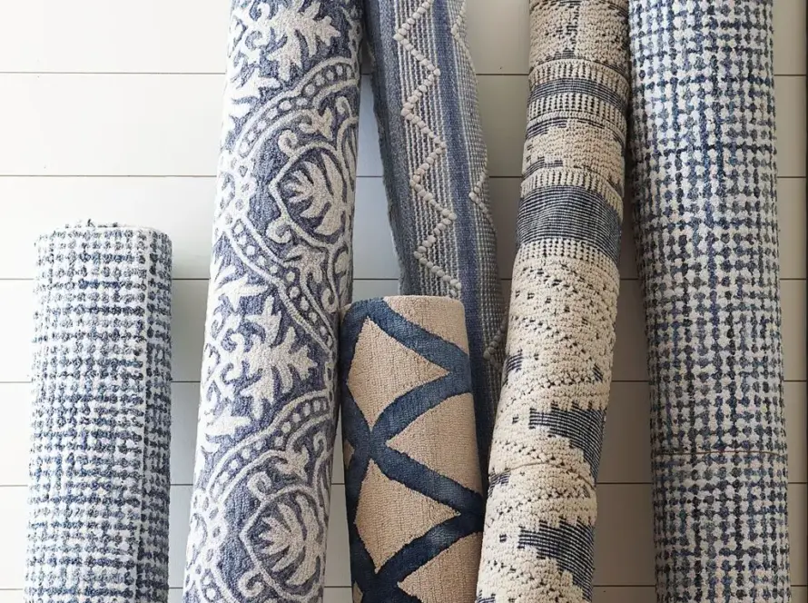 a bundle of various rugs